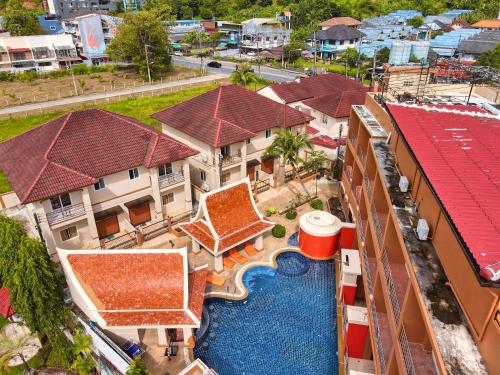 an aerial view of a resort with a pool and buildings at My Friend's House Karon in Karon Beach