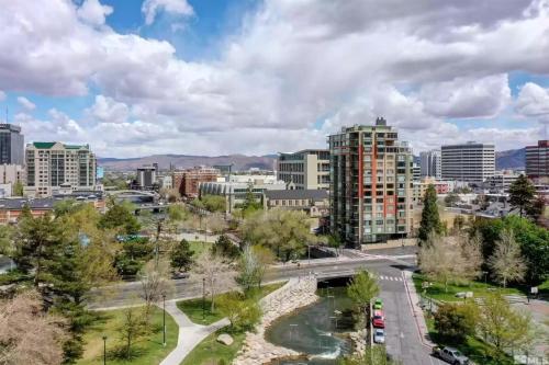 a view of a city with a river and buildings at Panorama Place in Reno