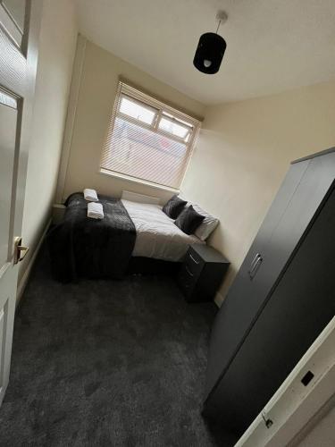 Una cama o camas en una habitación de conway flat
