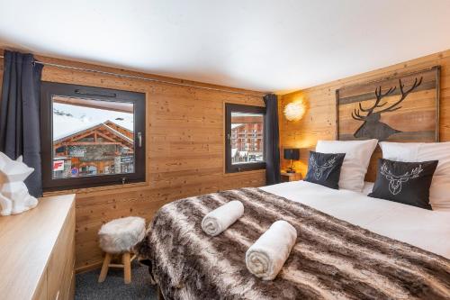 Val Thorens - Cosy Duplex Silveralp 004にあるベッド