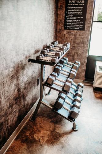 a row of exercising racks in a room at Cobblestone Hotel & Suites International Falls in International Falls