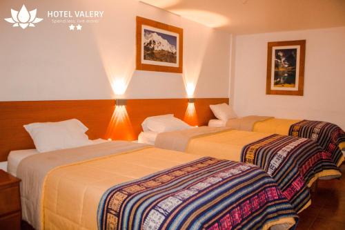 Cama o camas de una habitación en Hotel Valery 2 estrellas