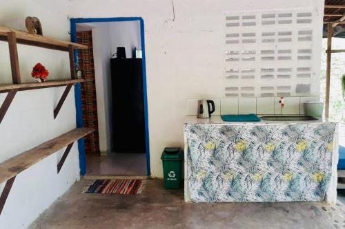 a room with a counter and a door in a room at Casa Itza in El Zaino