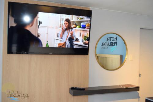 TV a/nebo společenská místnost v ubytování Hotel Perla del Caribe