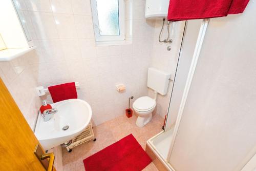 Kúpeľňa v ubytovaní Apartment Vrsi - Mulo 5951a