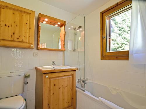 a bathroom with a sink and a shower and a mirror at Appartement 117m² aux Menuires, skis aux pieds, 4 chambres, prestations incluses - FR-1-613B-13 in Levassaix