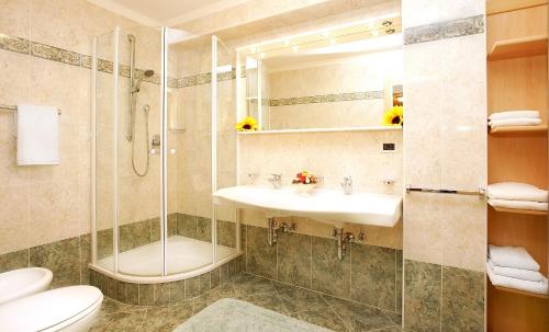 Ванная комната в Apartments La Baita