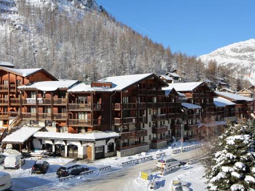 Charmant Duplex à Val-d'Isère avec Wifi, Parking et Balcon Exposé Sud