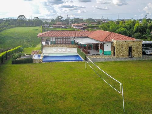 an aerial view of a house with a swimming pool at San Miguel de Montenegro in Montenegro