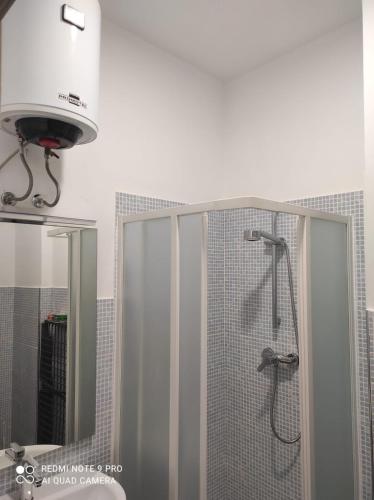 a bathroom with a shower with a glass door at Casa Veronica Boavista in Sal Rei