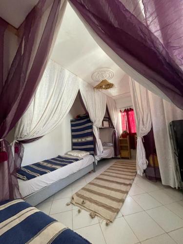 Katil atau katil-katil dalam bilik di Agachill Surf House