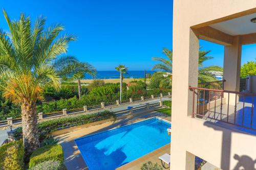 a view from the balcony of a house with a swimming pool at Villa Arbanassi in Lachi