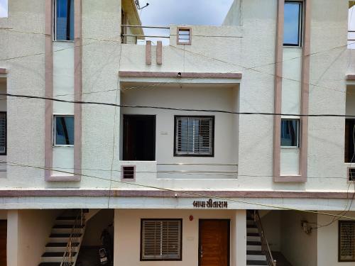 a view of the facade of a building at Bapa Sitaram Homestay in Garudeshwar