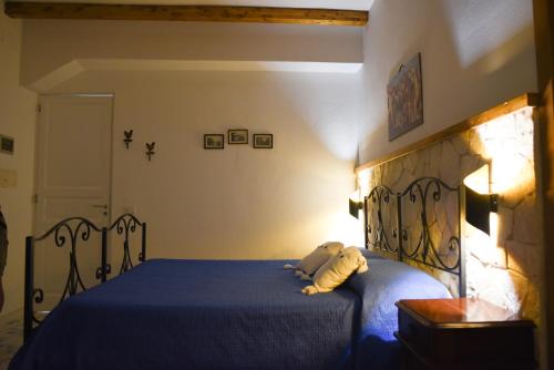 Postel nebo postele na pokoji v ubytování B&B Antico Palmento