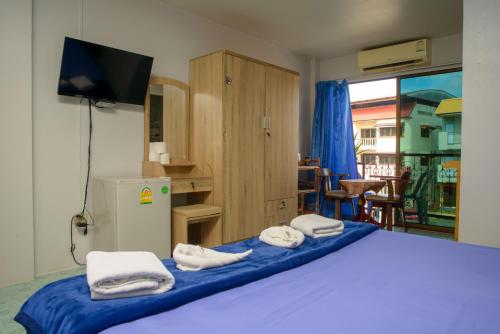 Postel nebo postele na pokoji v ubytování 2 Vikings Guesthouse