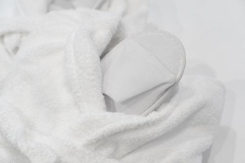 a white object is wrapped in a white blanket at Varese Suites in Varese