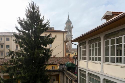 a christmas tree in the middle of a city at Varese Suites in Varese