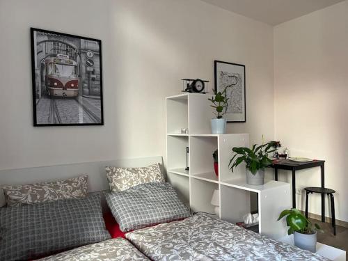Postel nebo postele na pokoji v ubytování Modern apartment Krymská & Francouzská street