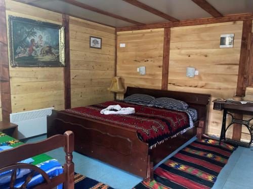 Postel nebo postele na pokoji v ubytování Kumova vodenica