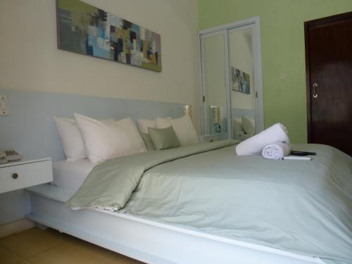 Кровать или кровати в номере Casus Dream Hotel