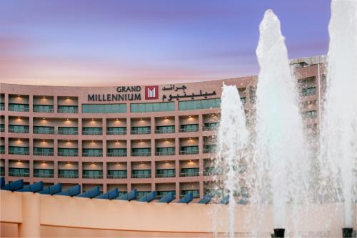 a fountain in front of the main building of the mgm hotel at Grand Millennium Gizan in Jazan