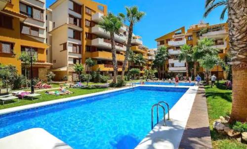 Turquesa Apartment,Punta Prima ,close to the beach plus 4 swimming pools