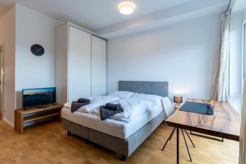 Ένα ή περισσότερα κρεβάτια σε δωμάτιο στο Handmade I Modern I Luxury I Kitchen I Home Office I Parkplatz