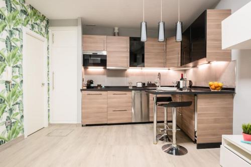 A kitchen or kitchenette at Mia Suite. Center of Seville