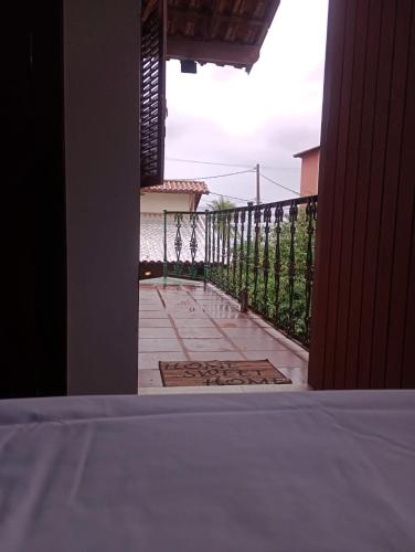 a view of a balcony from a house at RESONAMUH - Hostel in São Pedro da Aldeia