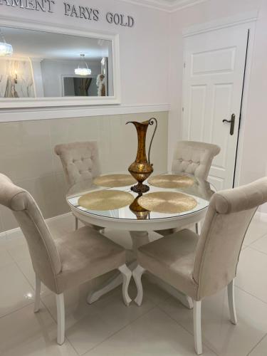 Χώρος καθιστικού στο Apartament Parys Gold