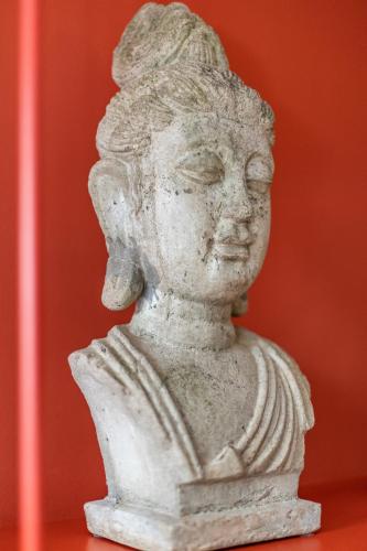 a statue of a bust of a woman at La Maison Pavie in Dinan