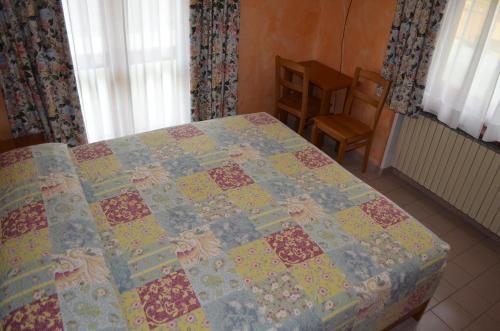 Posteľ alebo postele v izbe v ubytovaní Hotel Chateau des Dames