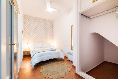 Posteľ alebo postele v izbe v ubytovaní Home4u Casa del Tesoro II