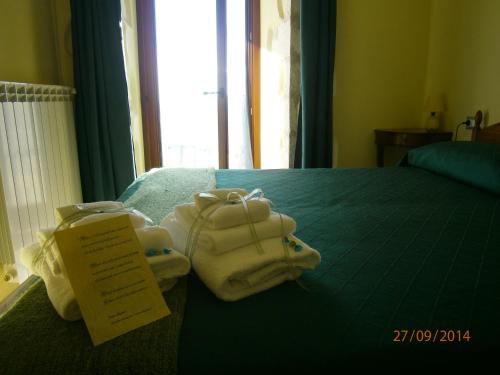 Postel nebo postele na pokoji v ubytování B&B Casa Mila'