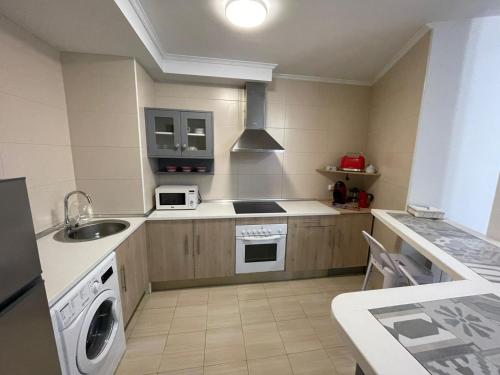 Dapur atau dapur kecil di Saron Centro 1