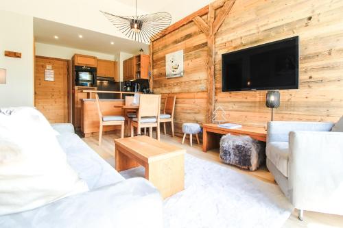 Televisyen dan/atau pusat hiburan di 1-bed apartment in 5* Residence with mountain views, ski in, ski out