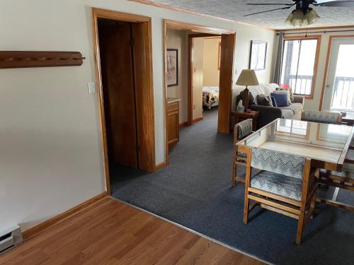 a living room with a table and a couch at 2 Bedroom 2 Bathroom - Blue Knob All Season Resort Condo in Claysburg