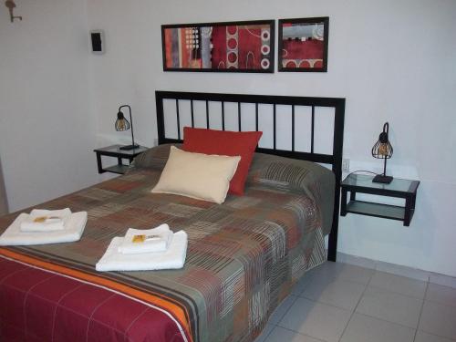 Llit o llits en una habitació de EVA Apartments 2