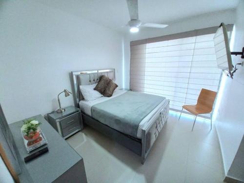 Postel nebo postele na pokoji v ubytování C1 Moderno-Hermoso apart completo con terraza