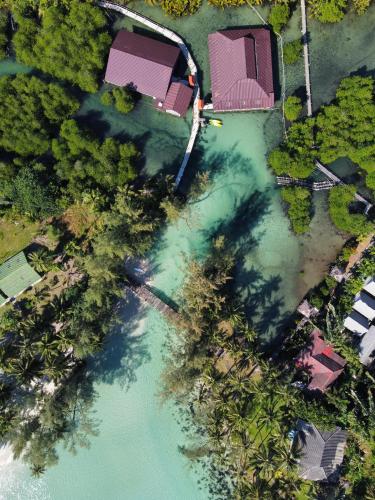 an aerial view of a body of water with trees at À La Koh Kood Resort in Ko Kood