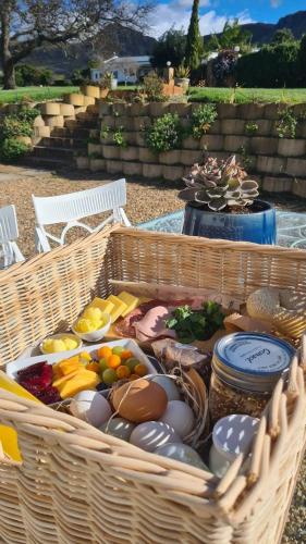 a basket filled with food and other foods at White Water Farm in Stanford