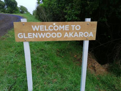 a sign that says welcome to glenwood azona at Glenwood Akaroa Bush Retreat - Totara Hut in Akaroa