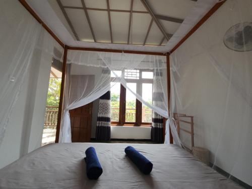 Ein Bett oder Betten in einem Zimmer der Unterkunft King CoCo House