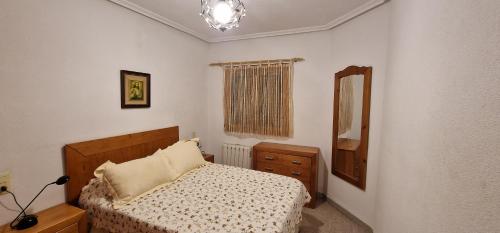 Llit o llits en una habitació de PalmeraV