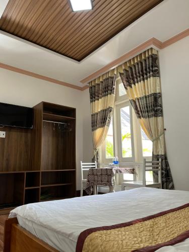 Katil atau katil-katil dalam bilik di Khách sạn Hương Mê
