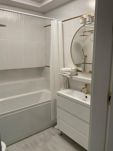 Ванная комната в Apartament „Dwie Wieże”