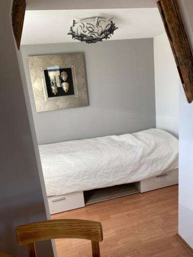 Postel nebo postele na pokoji v ubytování Ferienwohnung sentio-comfortable Saalfeld