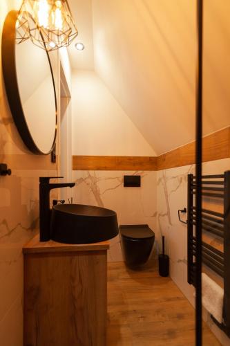 Ένα μπάνιο στο Apartament Z widokiem na las