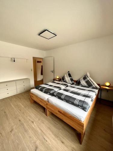 Katil atau katil-katil dalam bilik di Ferienwohnung am Hang mit malerischer Aussicht