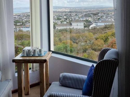 Zona de estar de Eagles View Langebaan with Lagoon View